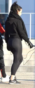 Brunette walking in leggings with a thick booty and showing some camel toe