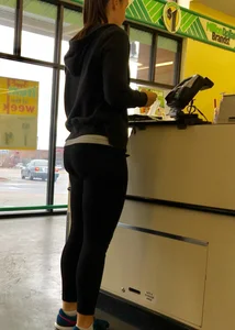 Thick booty girl shopping at Dollar Tree in leggings