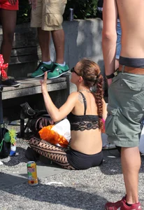 Boobs out in public in either bikini tops or bras