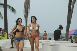 Saint Patrick's Day girls in bikinis at Deerfield Beach in Florida