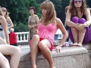 Pink skirt girl upskirted at fountain