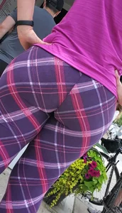 Perfect ass in purple leggings street closeup