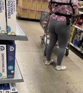 Hot milf wearing grey leggings! I have a video of it jiggling while she walks
