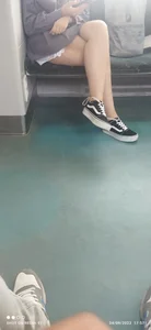 Cute candid girl with nice legs sitting with crossed legs in a public bus creepshots