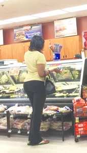 Big booty ebony milf out shopping in tight black leggings