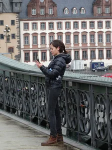 Cute petite girl in tight black jeans