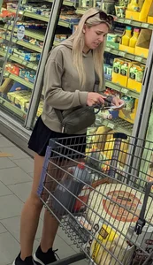 Cute petite wife with nice legs at the market (face)