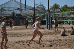 Beach volleyball blonde looking sexy and showing her body off