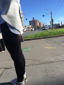 Blonde Girl With Fit Muscular Legs in Tight Black Jeans and Sneakers on a Crosswalk  - Street Creepshots Collection