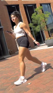 Curly Campus Brunette with amazing Bubble Butt in Tight Shorts (oc)
