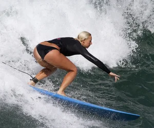 Candid surfer babes on the beach and in bikinis
