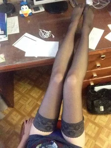 Teen JB in Stockings with Her Legs on Desk