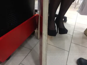 Legs in Black Pantyhose and High Heels Under Table Office Creepshots