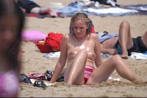 Girls on a nude beach in Bibione, Italy