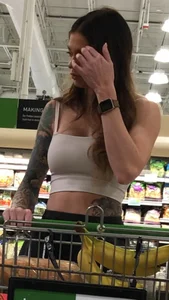 Tatted Fit slim brunette beauty at the market