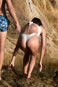 Iris Mittenaere in a white thong bikini on the beach in St Martin
