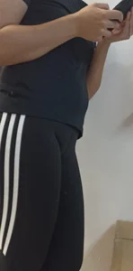 Beautiful blonde girl with amazing big ass in black adidas leggings, with a small camel toe [OC]