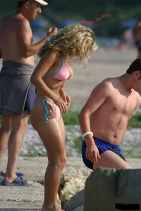 Beach voyeur girls in bikinis, thongs and topless