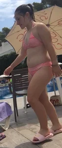 Chubby flat-chested girl at the beach