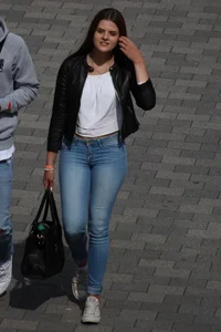 Pretty redhead in tight jeans with a nice booty