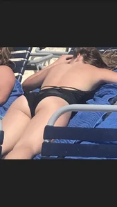 Girl in Swimsuit Lying on Sunbed