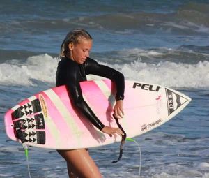 Hot surfer chicks out in the water