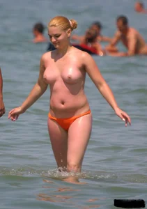 A bunch of sexy beach voyeur babes in bikinis, thongs and topless