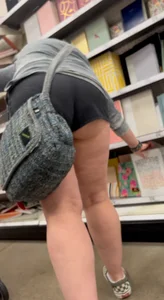 Almost busted by target security for this meaty mom showing cheeks