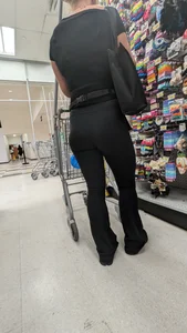 Beautiful tight blonde in black legging at dollar strore. oc