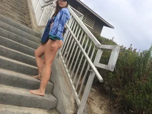 Blue thong beach babe walking up the stairs