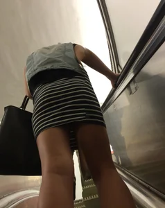 Sexy Subway Escalator Photos of a Girl in Striped Skirt