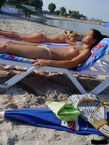 Beach voyeur girls in bikinis, thongs and topless