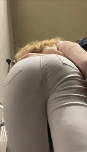 Juicy blonde in tight white jeans