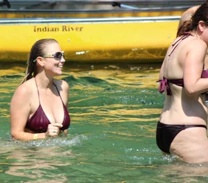 Two big boobed bikini babes in maroon bikinis
