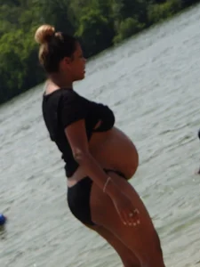 Two thick pregnant girls in bikinis
