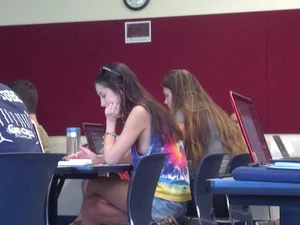 College girl in class showing sideboob with no bra on