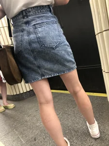 Nice candid ass in a denim skirt and skinny legs, creepshot at a subway station