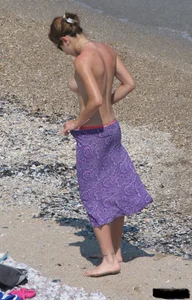 A bunch of sexy beach voyeur babes in bikinis, thongs and topless