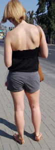 Nice Girl in Shorts on a Street