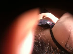 Breast under bra peeks