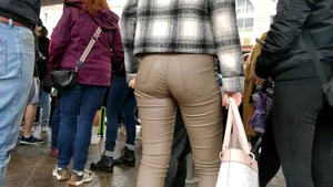 College girl in brown leather pants