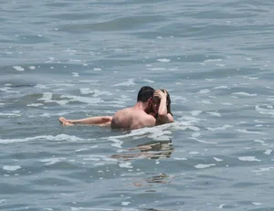 Hilary Duff in purple bikini in Malibu with a great ass and hard nipples