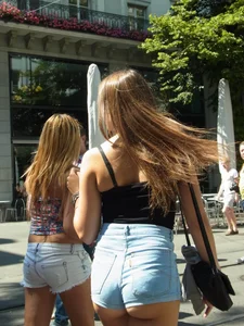 Sexy ass girl walking with friends in short shorts showing her nice ass cheeks