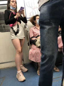 Cute Teen in Shorts, a Top and Sneakers Subway Huge Creepshots Collection