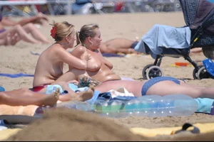 Girls on a nude beach in Bibione, Italy