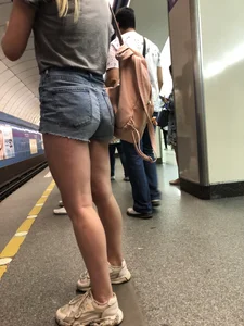 Girl with Hot Muscular Legs in Jeans Shorts Subway Creepshots