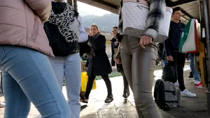 College girl in brown leather pants