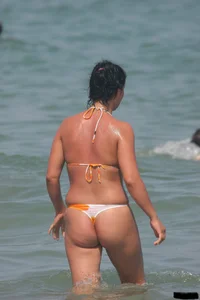 A bunch of sexy beach voyeur babes in bikinis, thongs and topless