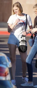 College babe in the parking lot in little denim shorts