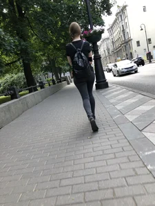 Skinny candid teen wearing tight black jeans walking down the street creepshots